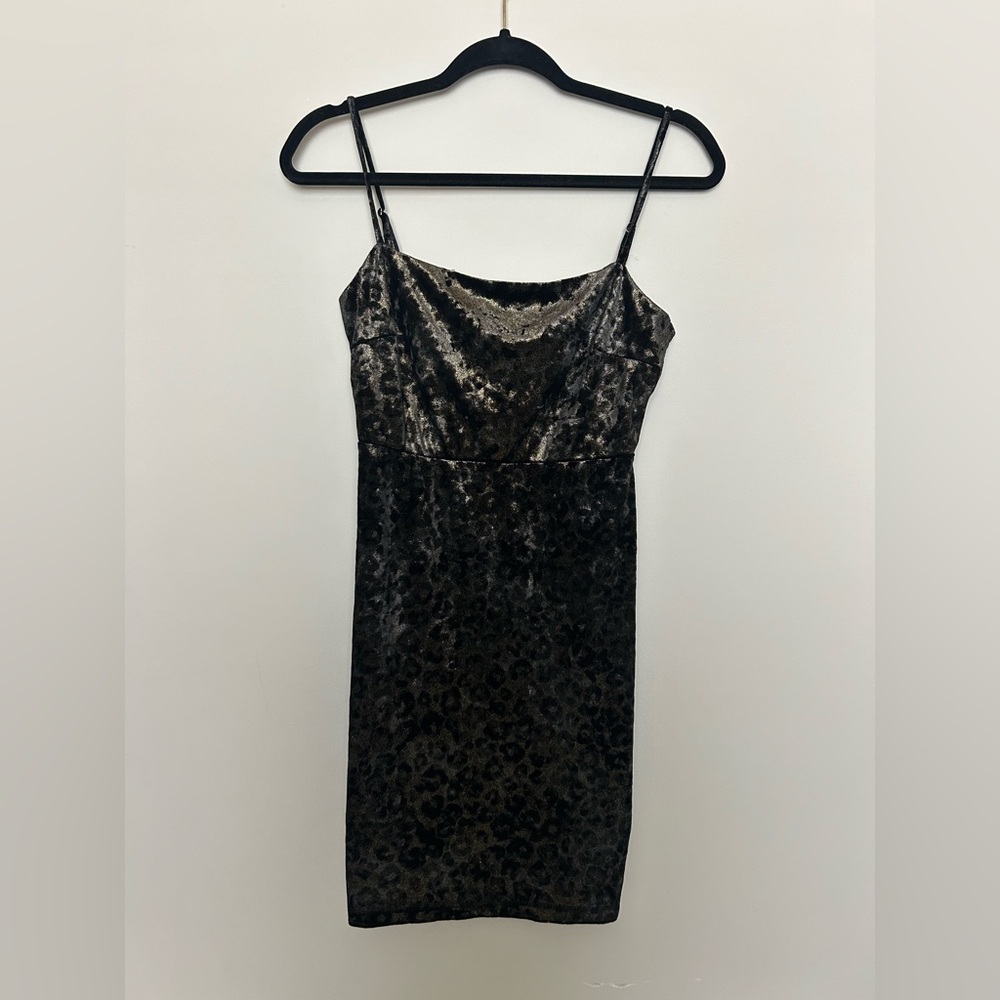Shimmery black and gold leopard print mini dress